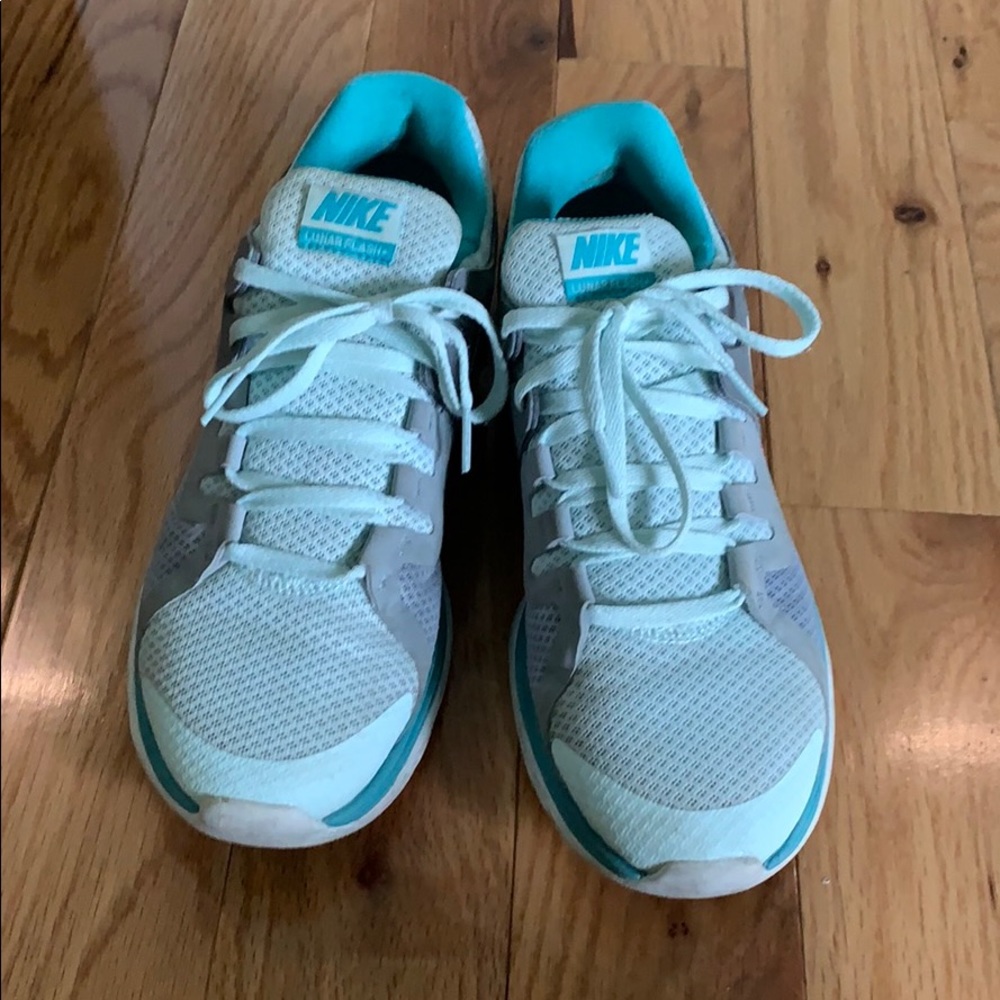 Blue and grey Nike tennis shoes
